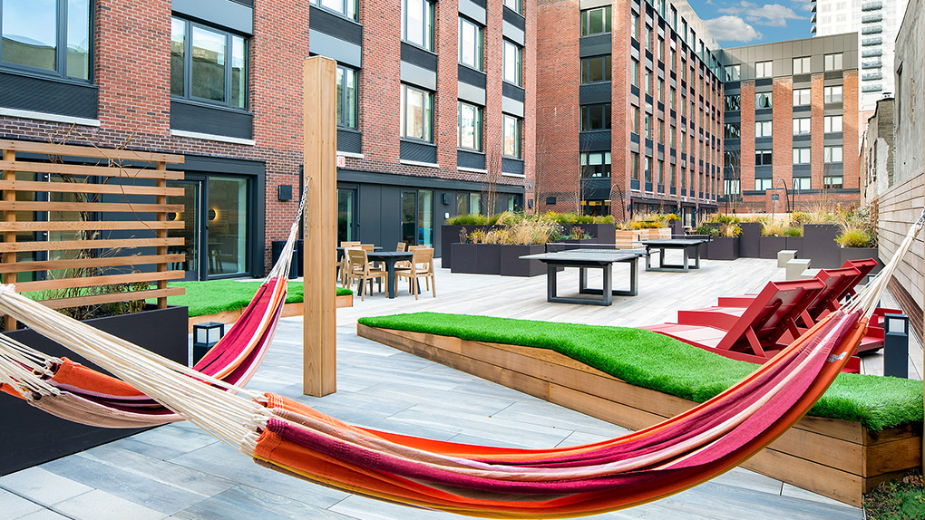Spacious Second Floor Courtyard with Hammocks and Ample Seating