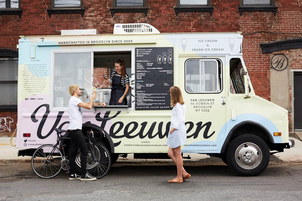 Van Leeuwen Ice Cream Truck on Street with Two Customers
